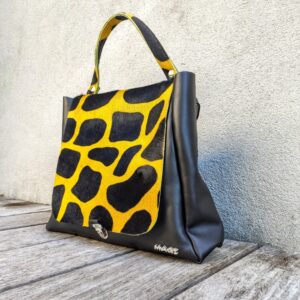 Dottò borsa zaino pelle nera e patta cavallino giraffa